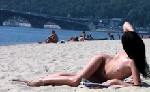 Skinny nude beach girl filmed on a video by a voyeur