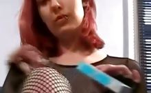 Redhead slut smoking while posing